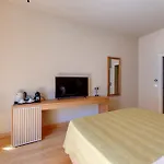 The Nestorian Syros Apartment